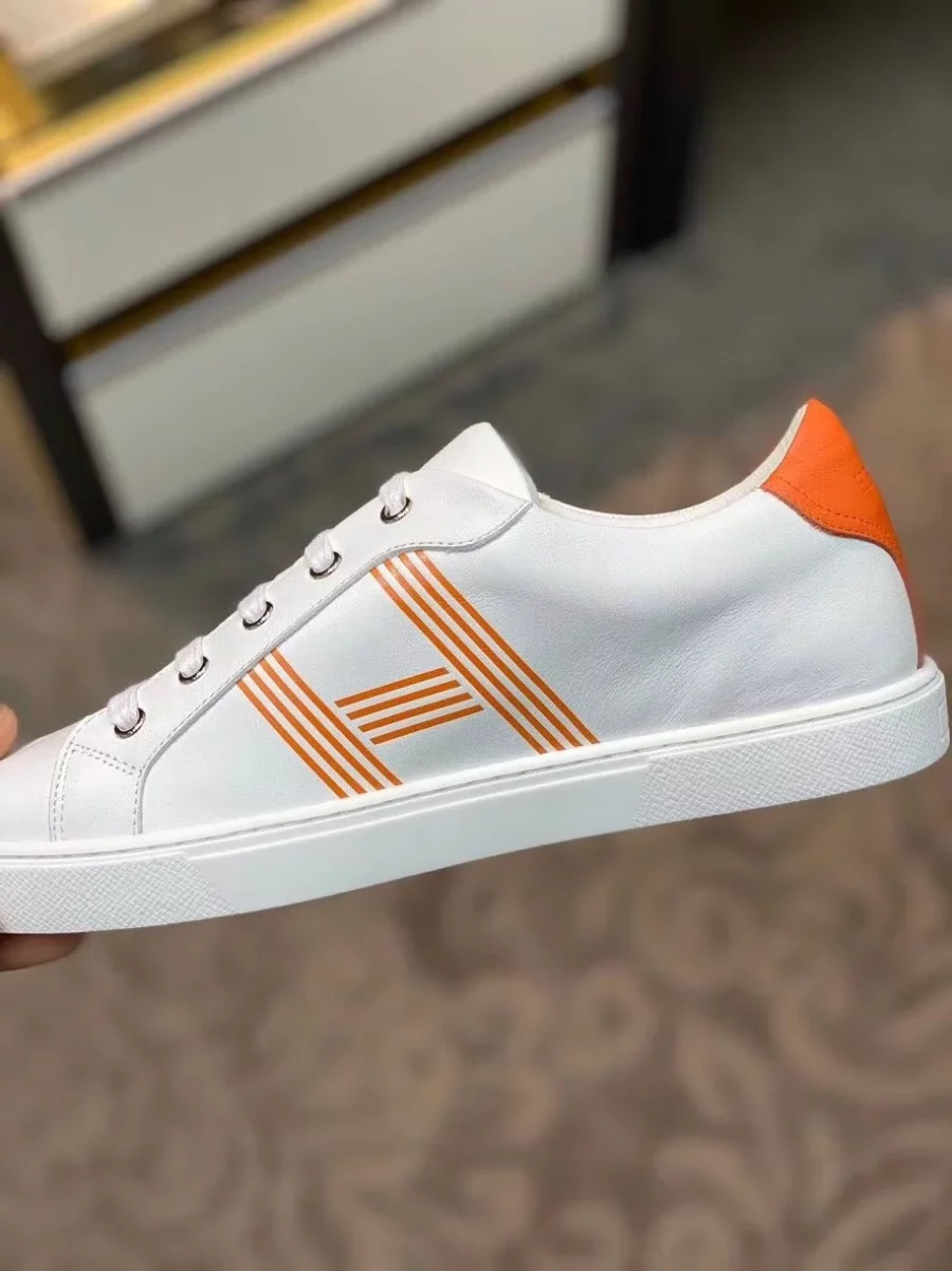 Hermes Men’s Avantage Sneakers In White/Orange Calfskin – HM061