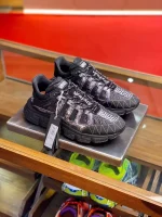 VERSACE WOMEN’S BLACK TRIGRECA SNEAKERS – VSS021