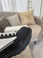 ALEXANDER MCQUEEN TREAD SLICK HIGH-TOP SNEAKERS – ALD035