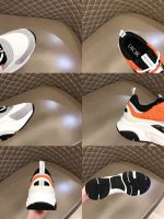 DIOR B22 SNEAKERS BLACK AND WHITE TECHNICAL MESH WITH ORANGE AND WHITE SMOOTH CALFSKIN – DO003