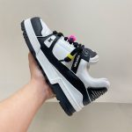 LOUIS VUITTON TRAINER MAXI LOW-TOP SNEAKERS IN WHITE AND BLACK – LVS116