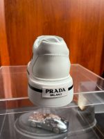 PRADA MACRO RE-NYLON AND BRUSHED LEATHER SNEAKERS – PRS056
